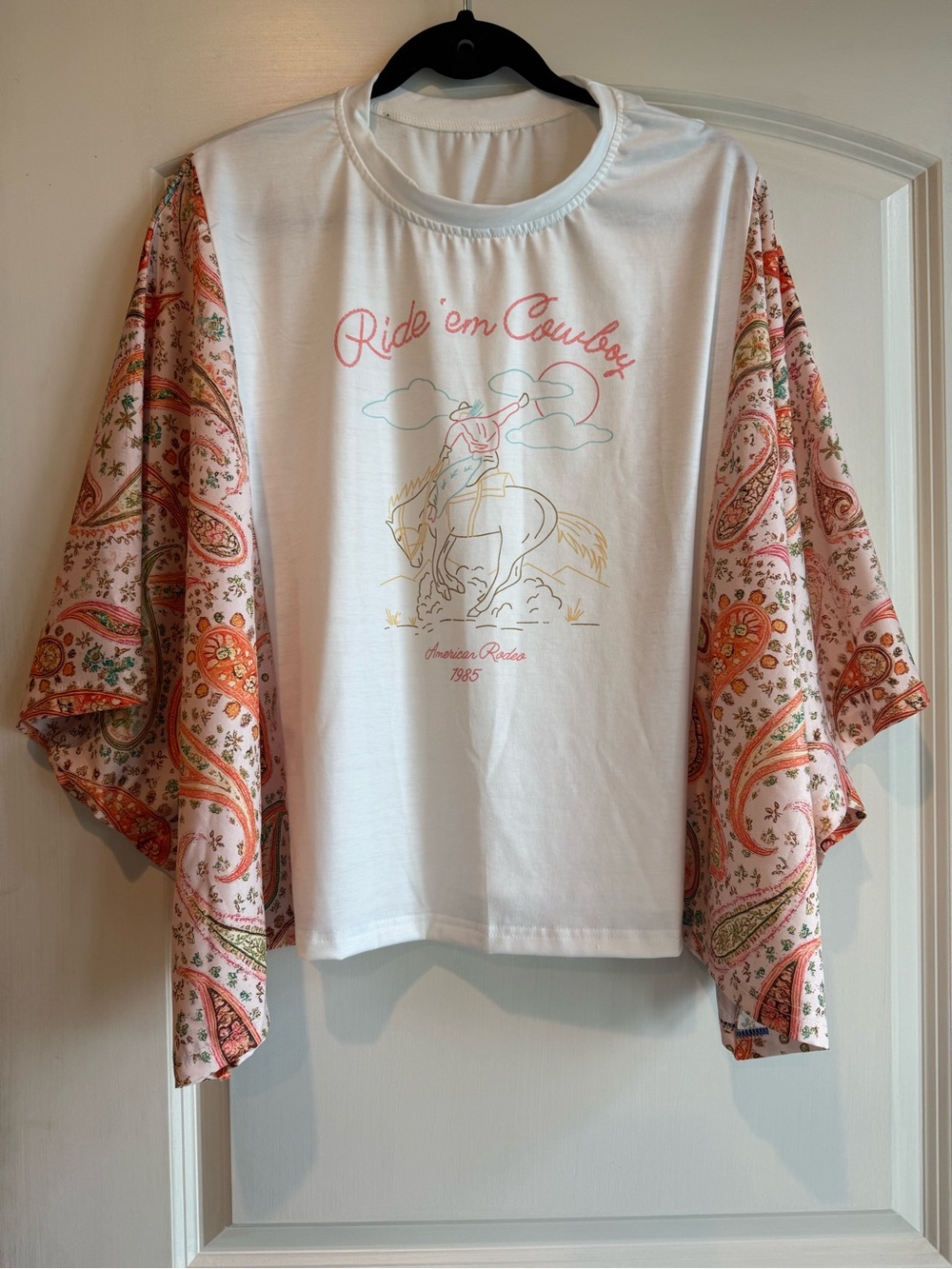 Women’s White Tee with Pink Paisley Sleeves - Ride 'em Cowboy.